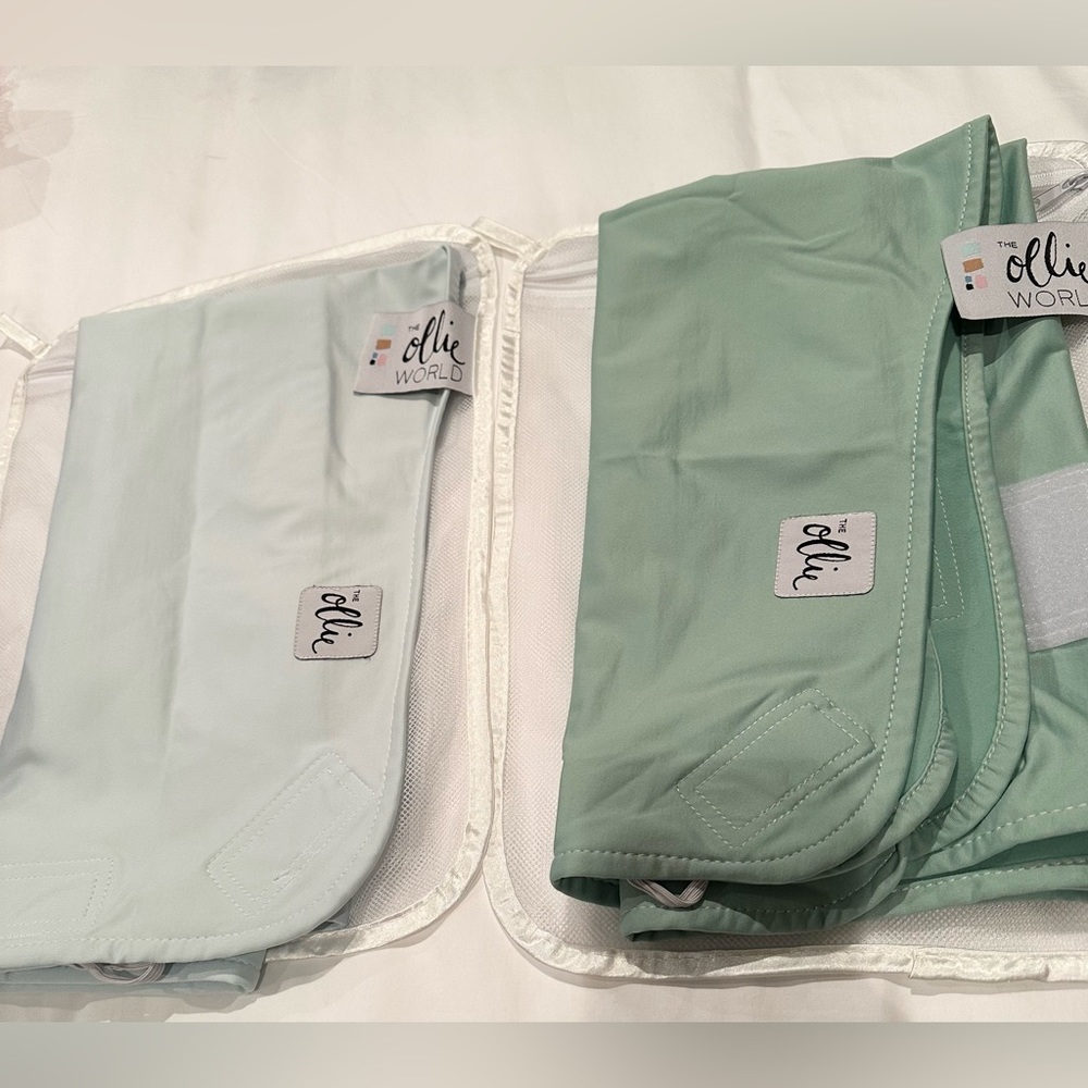 2 Ollie Swaddles blue and green